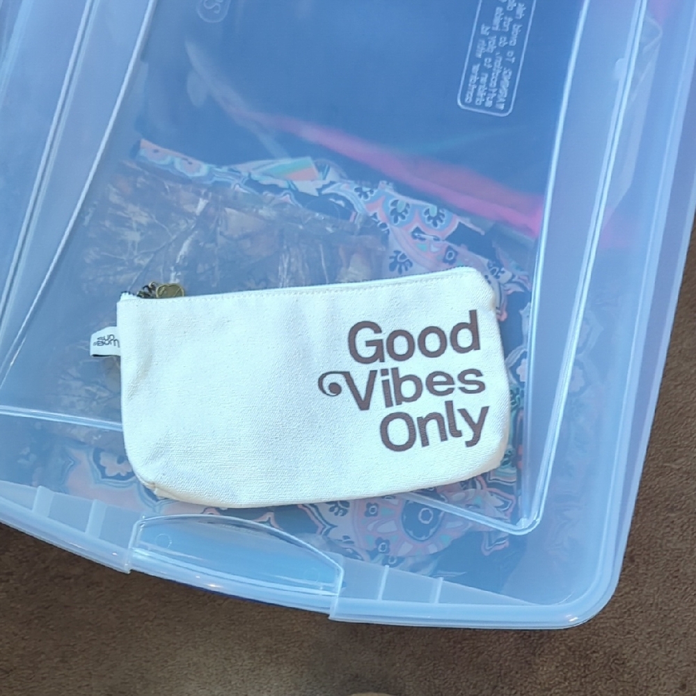 White Pouch with 'Good Vibes Only' Text